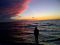 Janeanne and sea gulls at sunset